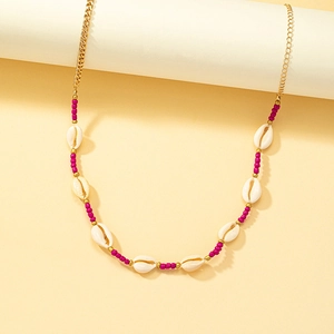 Bohemian seashell body chain with pink beads and gold link chain for women