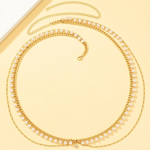 Elegant multi-layer gold waist chain with white pearls and sparkling rhinestone pendant