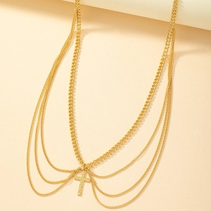 Layered gold cross chain necklace with chunky Cuban links and textured cross pendant