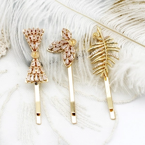 Ensemble de barrettes à cheveux nœud et feuille plaqué or 18 carats avec zircones