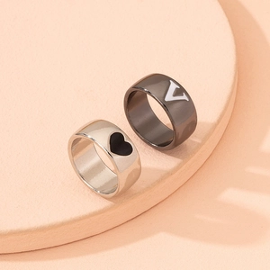 Minimalist heart and letter V couple rings set in polished silver and gunmetal finish