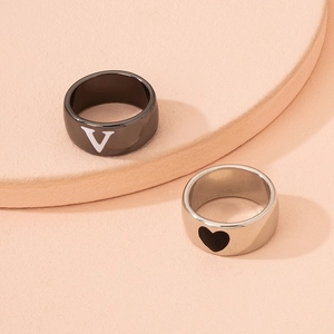 Minimalist heart and V-letter couple ring set in gunmetal and silver finish