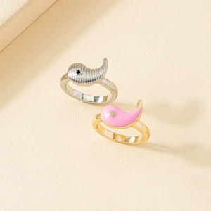 Minimalist dolphin-themed yin-yang rings in silver and pink enamel finish for women