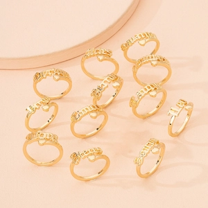 Set of 12 adjustable 18K gold plated titanium steel zodiac rings with heart charms