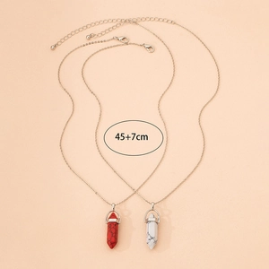 Two pieces of hexagonal stone bullet pendants on metal chains with 45+7cm length