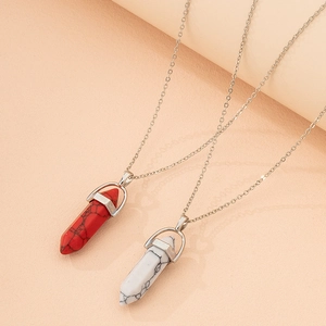 Hexagonal crystal bullet pendants with red and white stones on silver necklaces