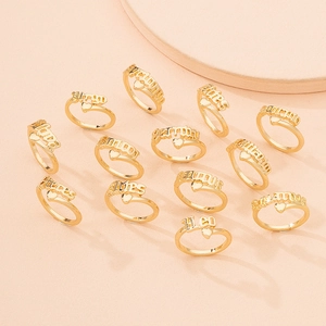 Set of 12 adjustable zodiac rings in 18K gold finish with Gothic fonts and heart charms