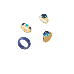 Set di quattro anelli blu e oro con motivi in resina marmorizzata e disegni in smalto