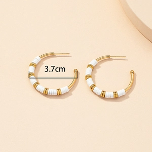 Bohemian gold C-shaped hoop earrings with white heishi beads in 3.7cm outer diameter