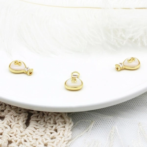 18K gold plated copper money bag pendants with white mother of pearl and dollar sign charm