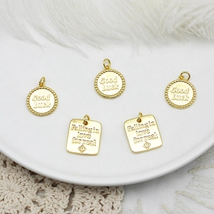 18K gold plated DIY jewelry pendants featuring Good Luck and heart engraving on white lace