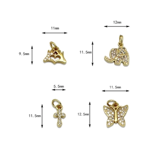Gold micro-pave charms set with elephant, cross, butterfly, and heart hand pendants