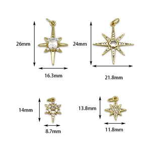 Set of four 18K gold plated copper star pendants with white zircon in various sizes