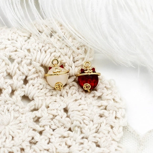 DIY Lucky Cat and coin pendant charm with gold accents on white lace background