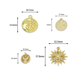 Gold plated celestial charms with moon, sun and star designs showing dimensions