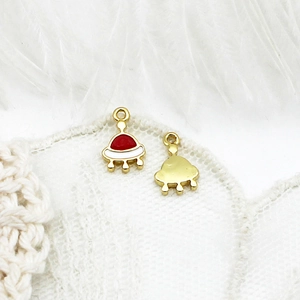 Detail of double-sided UFO charm in 18K gold plated alloy for DIY jewelry making