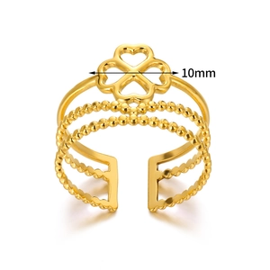 Detail of 10mm cutout clover design on multi-layer gold plated stainless steel ring