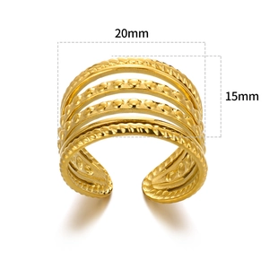 Macro shot showing 20mm diameter and 15mm width details of the gold multi-layer ring