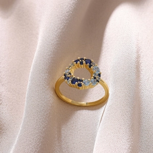 Zircon heart geometric ring with blue crystals in 18K gold-plated wreath design