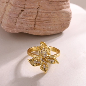 Detailed macro view of 18K gold plated zircon butterfly ring with sparkling petal details