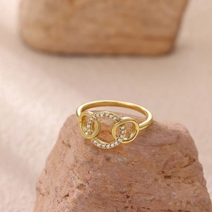 Minimalist interlocking triple band ring with zircon pave in a gold-plated polished finish