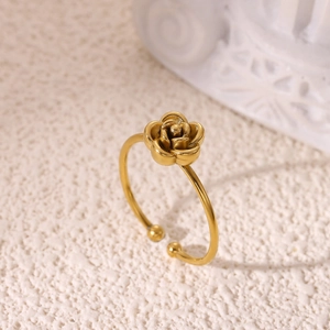 Close-up of a 18K gold-plated stainless steel ring featuring a detailed rose flower design