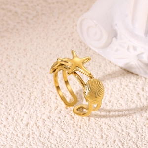 18K gold plated stainless steel open ring featuring a starfish and seashell design