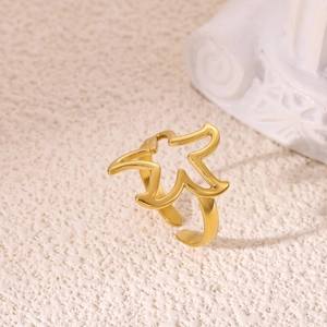 Detailed macro view of 18K gold plated adjustable hollow star ring with polished finish