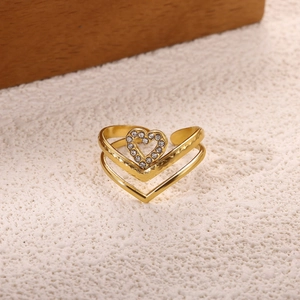 Detail of 18K gold-plated double V-shaped ring featuring a sparkling zircon heart detail