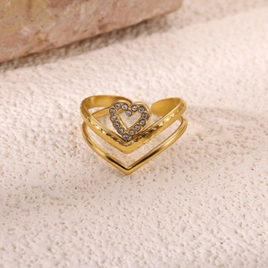 Macro shot of 18K gold plated heart ring with micro-pave zircons and double V band