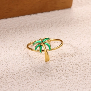 Detailed macro view of 18K gold plated ring featuring a tropical green enamel coconut tree