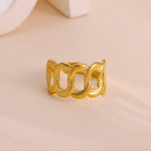 Detailed view of gold plated open chain ring with hollow geometric link design