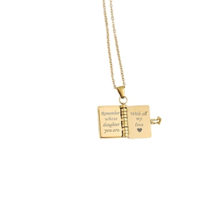 Golden stainless steel book locket necklace with opening pages and engraved message