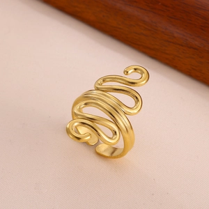 Detail of gold-plated stainless steel ring with elegant multi-layer wave hollow design
