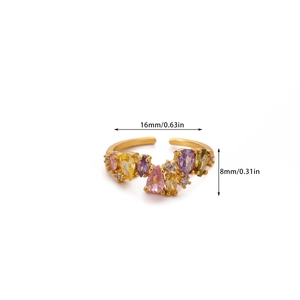 Macro detail of 18K gold plated ring featuring colorful pear-shaped zircon stones