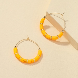 Summer gold hoop earrings with vibrant orange heishi beads and gold spacer accents
