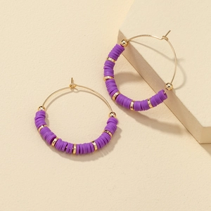 Bohemian gold hoop earrings with purple clay beads and golden spacers for women