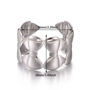 Detailed size view of silver hollow bow open bangle measuring 56mm by 38mm