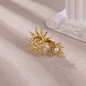 Vintage gold sun open ring with zircon and pearl accents in a geometric elegant style