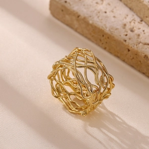 Detailed close-up of golden irregular layered hollow woven design stainless steel ring