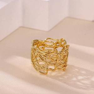 Minimalist gold woven wire mesh ring with an artistic hollow irregular design