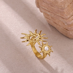 Golden sun motif open ring with pearl accent and spiral ray design for women