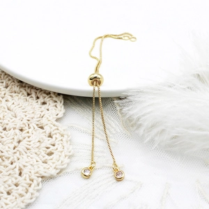 Adjustable 18K gold plated box chain bracelet with sliding bead and zircon pendants