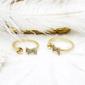 Detail of 18K gold plated bow ring setting with zircon inlay for pearl DIY crafts