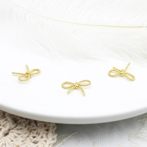 18K vergulde strikhangers met getordeerde textuur voor DIY sieraden maken