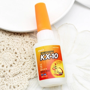 Close-up of Kroxx KX-10 20g high-strength instant glue bottle on white lace background