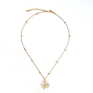 Collar de playa dorado de acero inoxidable con colgante de concha y estrella de mar elegante