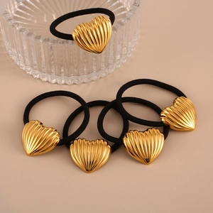 Set of 5 elastic hair ties with gold heart charms featuring vertical striped texture