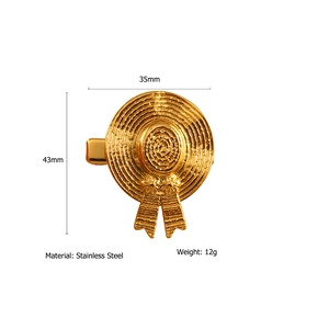 Macro shot of gold straw hat hair clip details with dimensions 35mm by 43mm