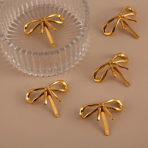 Five pieces of elegant 18K gold-plated dragonfly hair clips with polished metallic finish